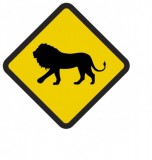 Śmieszne znaki drogowe z egzotycznymi zwierzętami (lew)